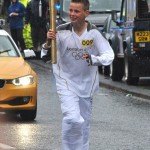 Logan Jones carried the Olympic torch into Amble