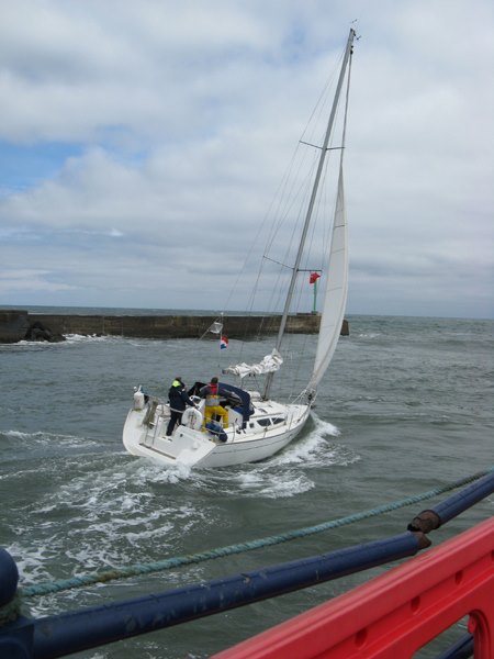 A yacht ventures forth
