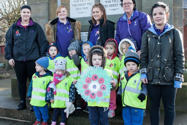 Amble children pay their respects to the fallen