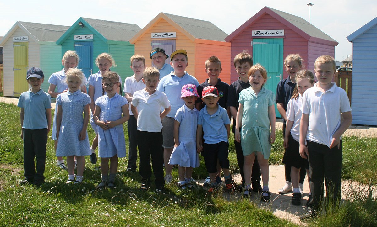 Amble-Links-children-and-beach-huts