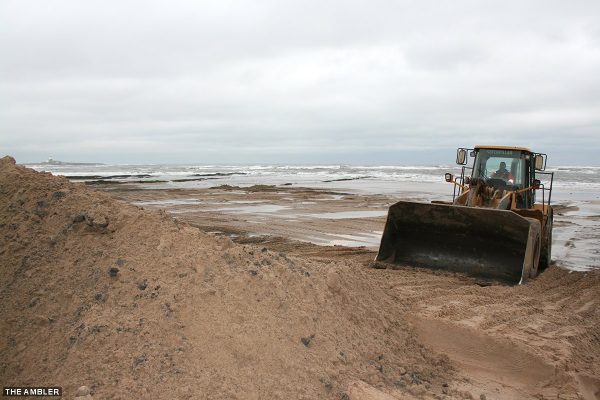 Woman falls in quicksand during dune restoration