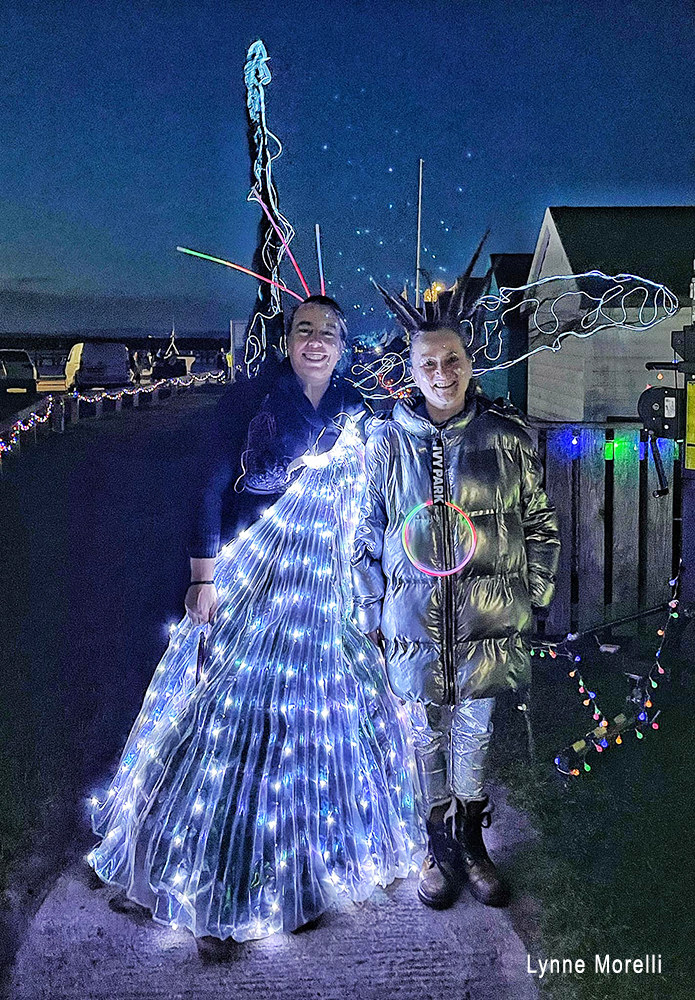 Two Women Wearing Lights at the Festival