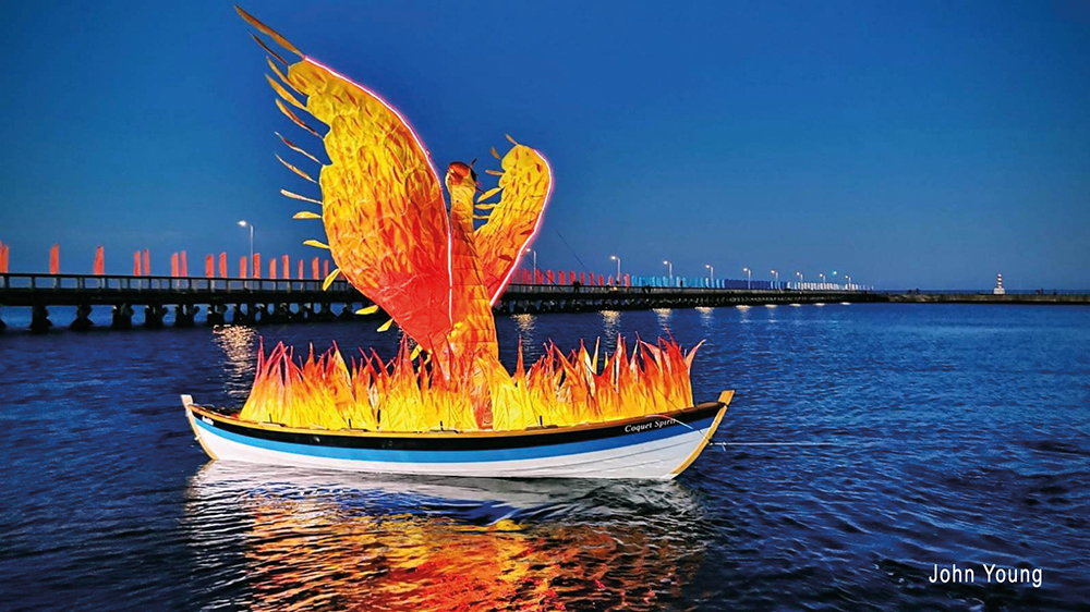 Floating Phoenix with Lights Reflected in the Water