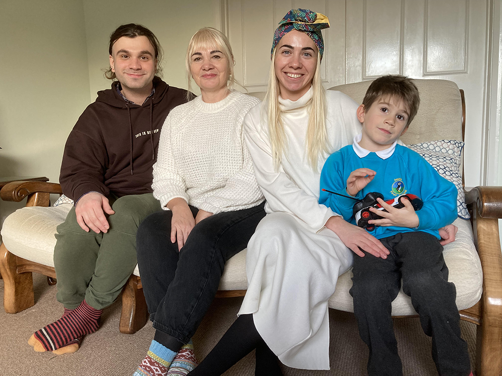 A photo of George, Dina, Krystyna and 4 year old Sviatoslav from Ukraine in their new home in Amble