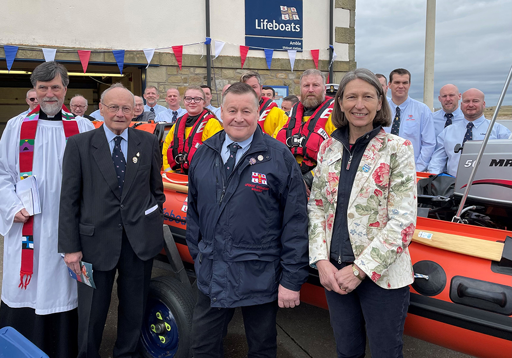 RNLI dignitaries and crew with the new Amble inshore lifeboat